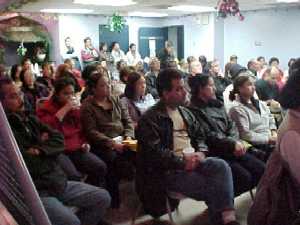The audience listens attentively to Pat's speech at the "Once in a Lifetime" event in Winnipeg. November, 2003.